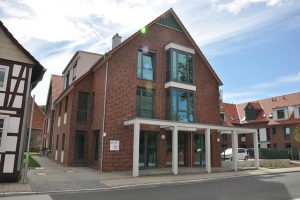 Bild vom abgeschlossenem Bauprojekt mit 27 Wohneinheiten und 2 Gewerbeeinheiten + Tiefgarage in Pattensen