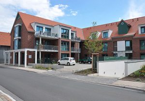 Bild vom abgeschlossenem Bauprojekt mit 27 Wohneinheiten und 2 Gewerbeeinheiten + Tiefgarage in Pattensen