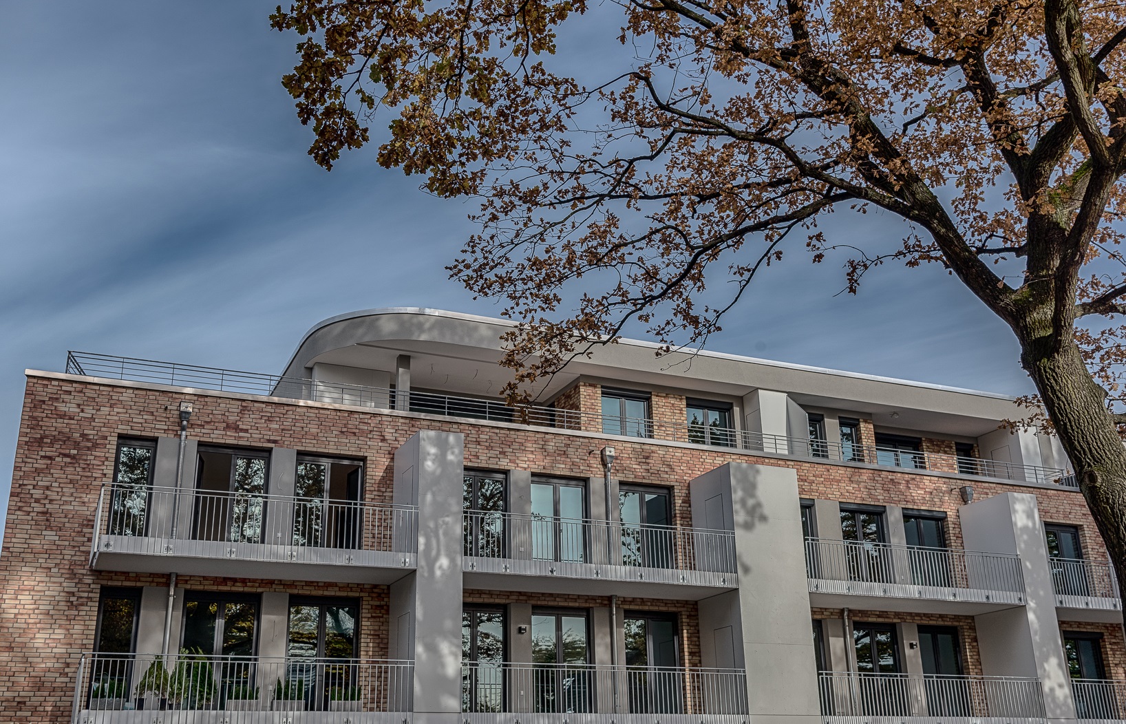 Neubau mit 15 Wohneinheiten und 5 Reihenhäuser, Hamburg